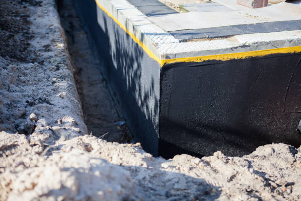 Professional Interior Drainage System technician working in Greensburg, KY